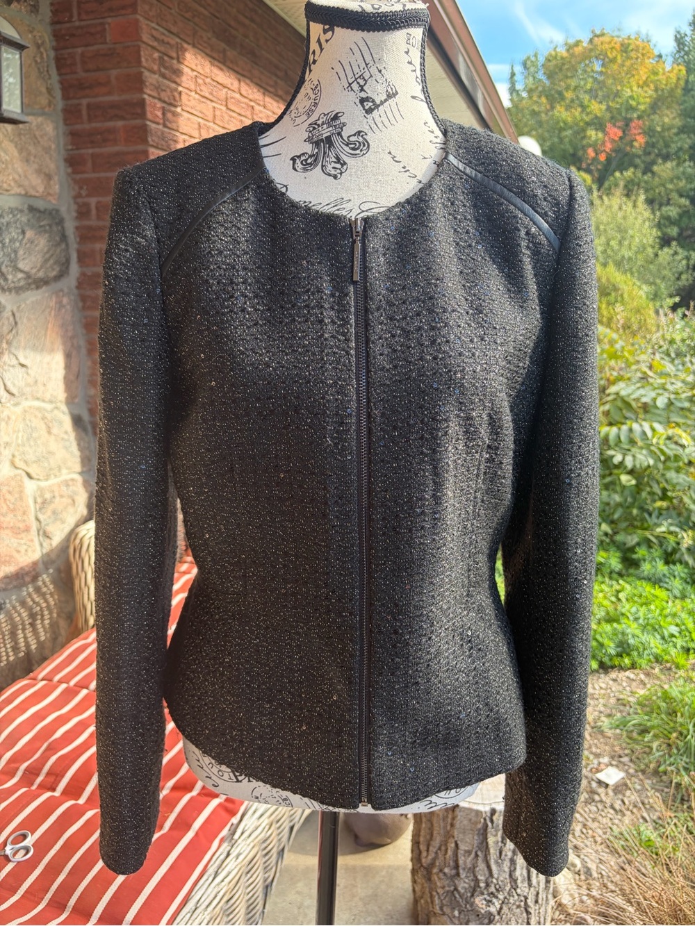 Calvin Klein Size 6 Black Textured Zip-Front Blazer has a shimmer to it